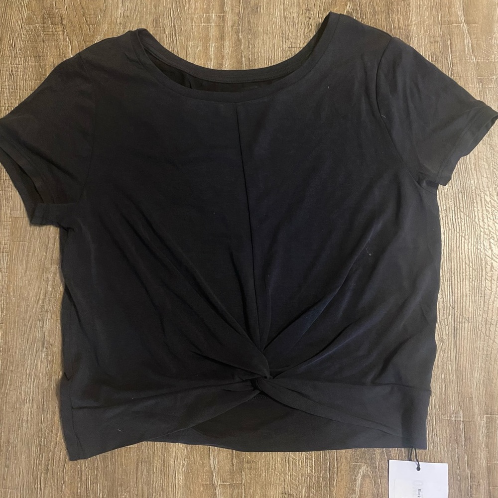 Zyia twist in the front crop top.